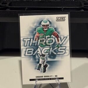 🔥 2025 Panini Score Saquon Barkley Throw backs Card. Philadelphia Eagles